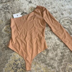 LPA size small tan body suit